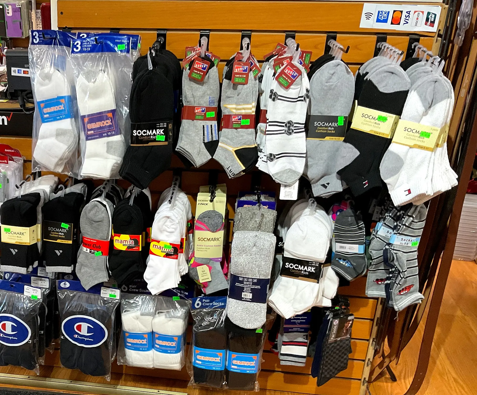 Packs of socks and underwear on a display rack